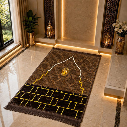 A rectangular prayer rug with fringe, shown laid out on a polished marble floor in a luxurious interior setting. The rug features a dark brown and black pattern with a white mihrab design and yellow geometric border details.
