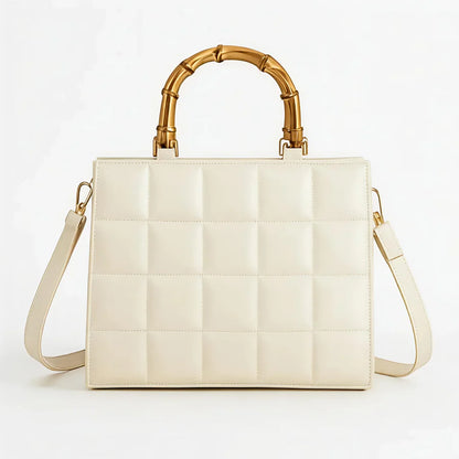 Wonder Mart Milano Bamboo Luxe Quilted Handbag in Black featuring premium leather, quilted design, bamboo-style top handles, gold-tone hardware, spacious interior, and adjustable shoulder strap....