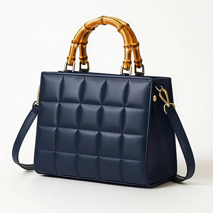 Wonder Mart Milano Bamboo Luxe Quilted Handbag in Black featuring premium leather, quilted design, bamboo-style top handles, gold-tone hardware, spacious interior, and adjustable shoulder strap.