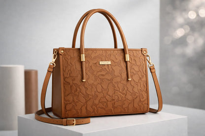Wonder Mart Vienna Royale Embossed Tote Handbag in Royal brown featuring premium faux leather, elegant embossed floral texture, gold-tone hardware, structured design, top handles, and detachable shoulder strap.