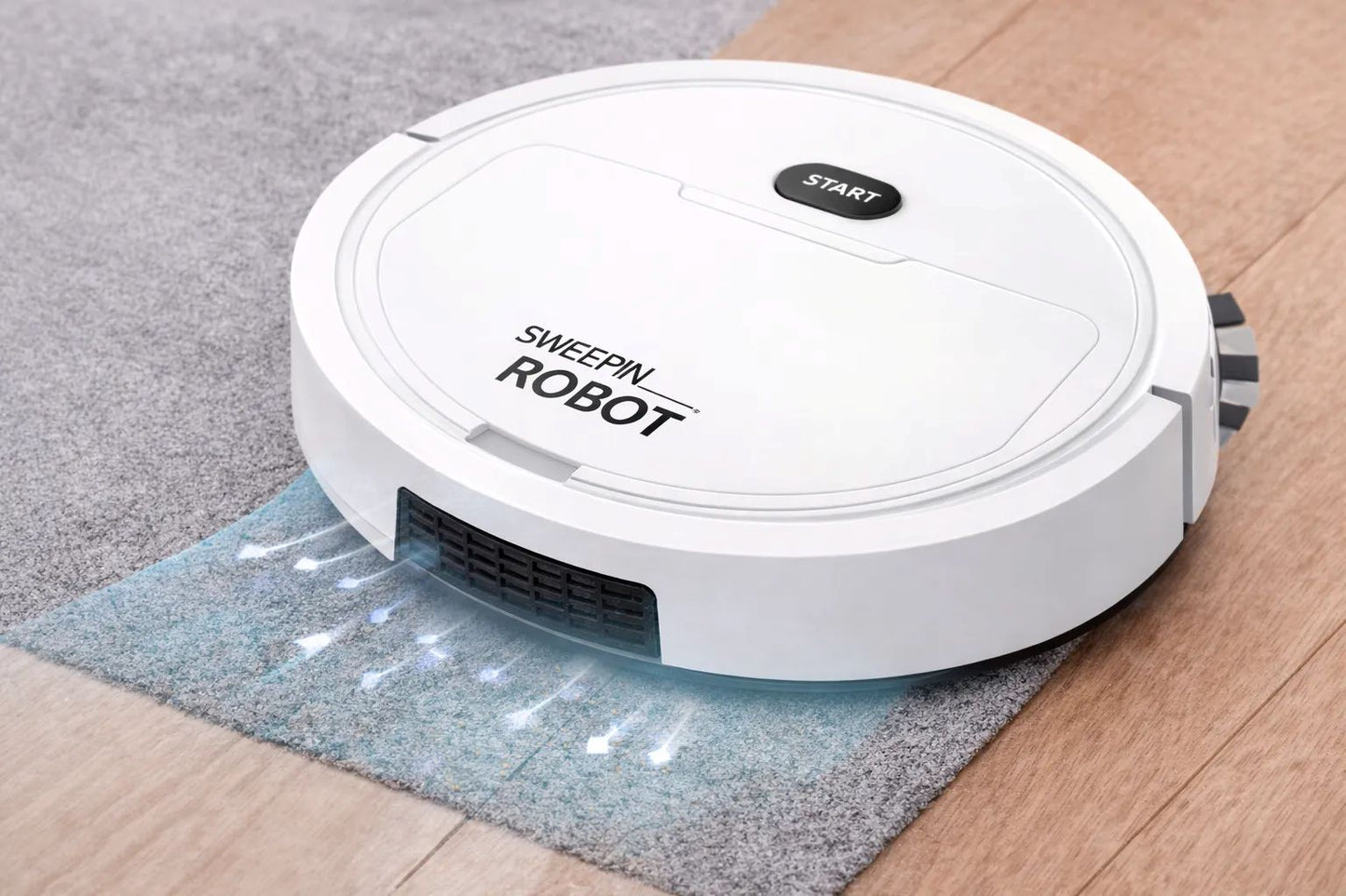 White robotic vacuum cleaner on a wooden floor with a rug